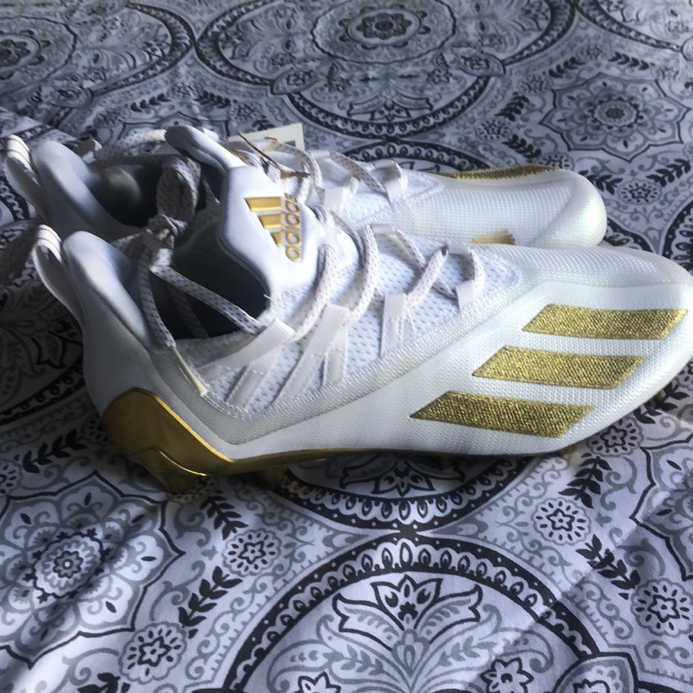 Brand new cleats! White and Vegas gold
